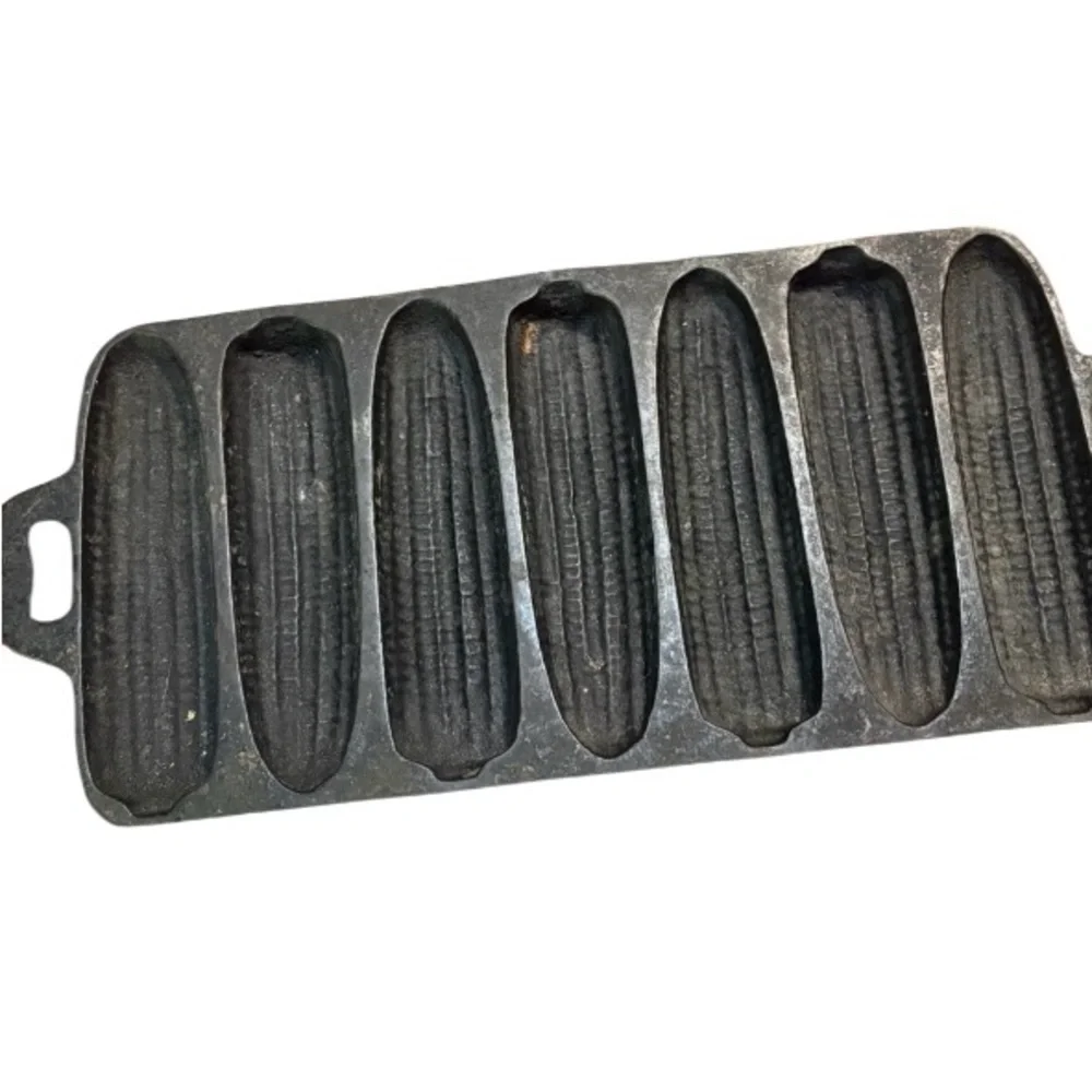 cast iron cornbread pan designed to bake corncob-shaped sticks
